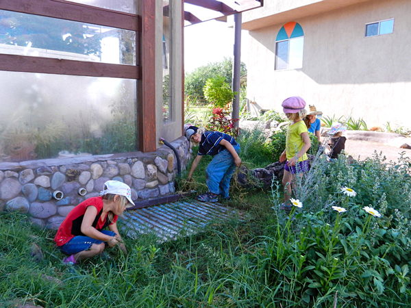 The Children love helping in the garden during Hands-in-the-soils mornings. Photo by Global Change Media.