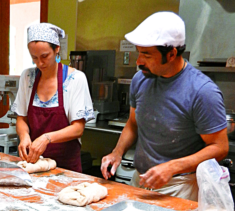 GenaVein learning to make artisan bread from Don Guerra with Tucson-based Barrio Bread.