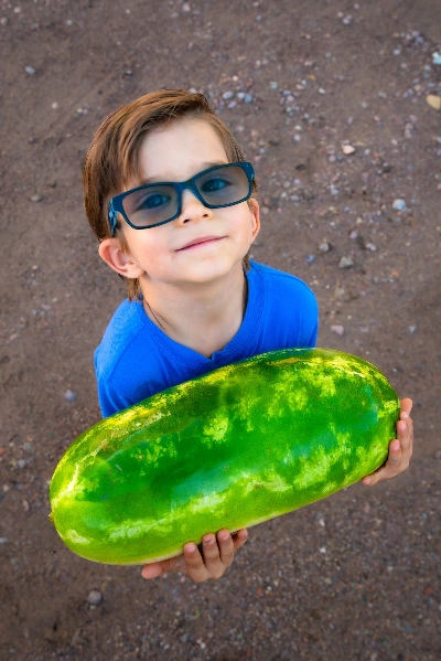 Little boy holding watermelon at GSSU