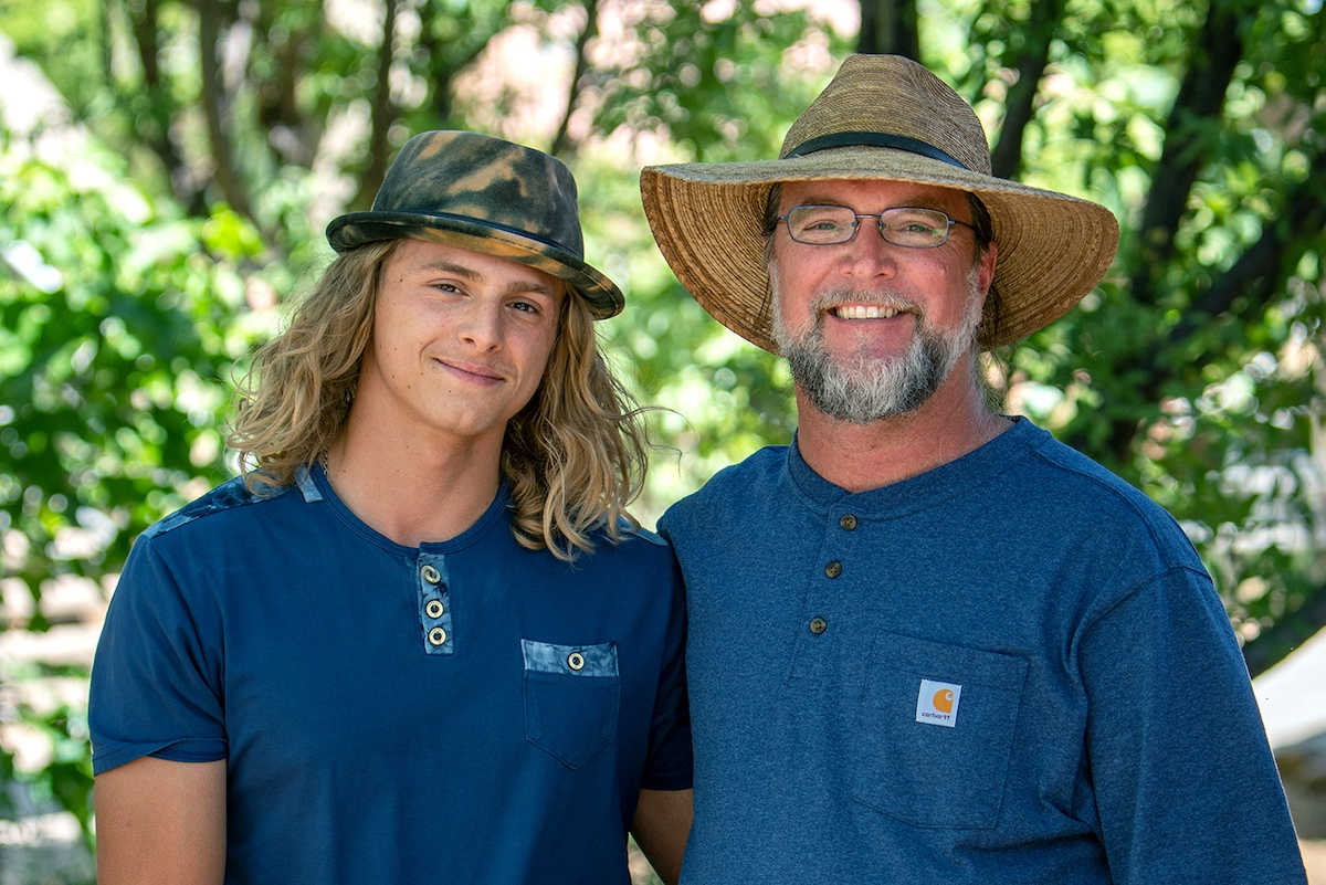 Counselor Arlin with a young man